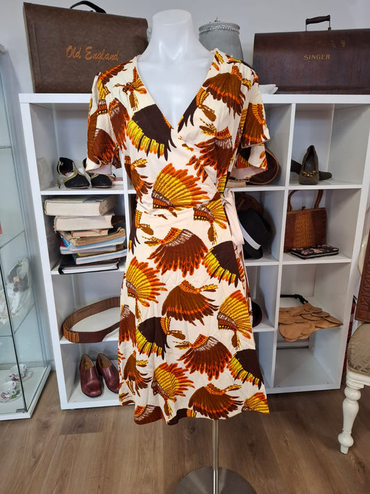 Short Sleeves Wrap around mini dress V- neck with butterfly sleeves. Belt included. Semi stretch.