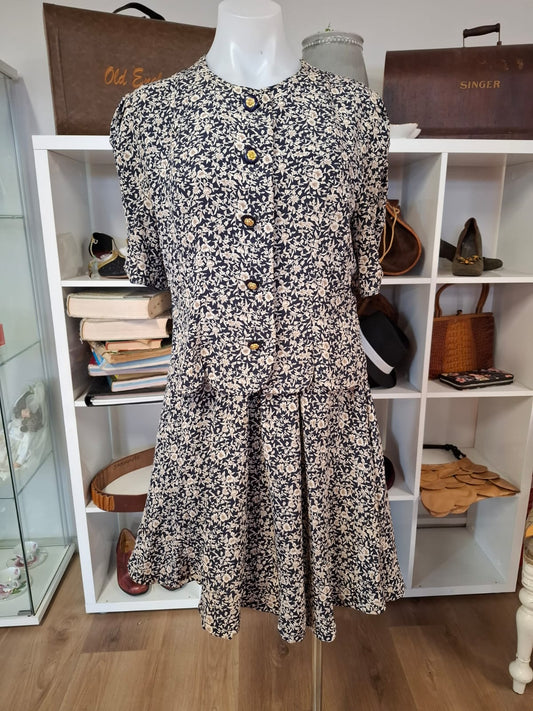Lamballe Authentic Fashion Intact blaser/ topper.  Elbow sleeves complete buttons down of the topper. Stretchable waistline. Mini dress. Skater skirt style. Sleeveless inner zipper type.