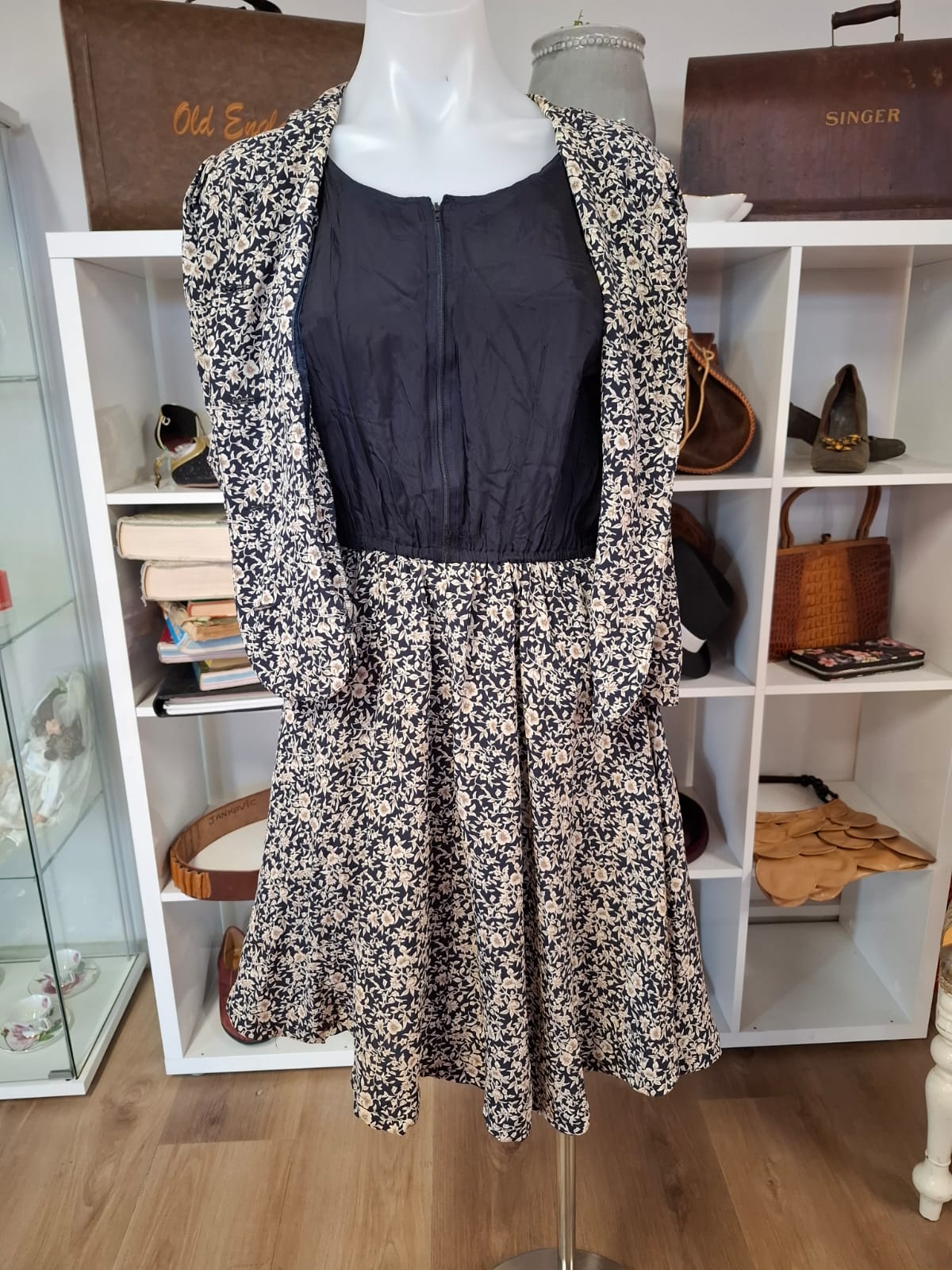 Lamballe Authentic Fashion Intact blaser/ topper.  Elbow sleeves complete buttons down of the topper. Stretchable waistline. Mini dress. Skater skirt style. Sleeveless inner zipper type.