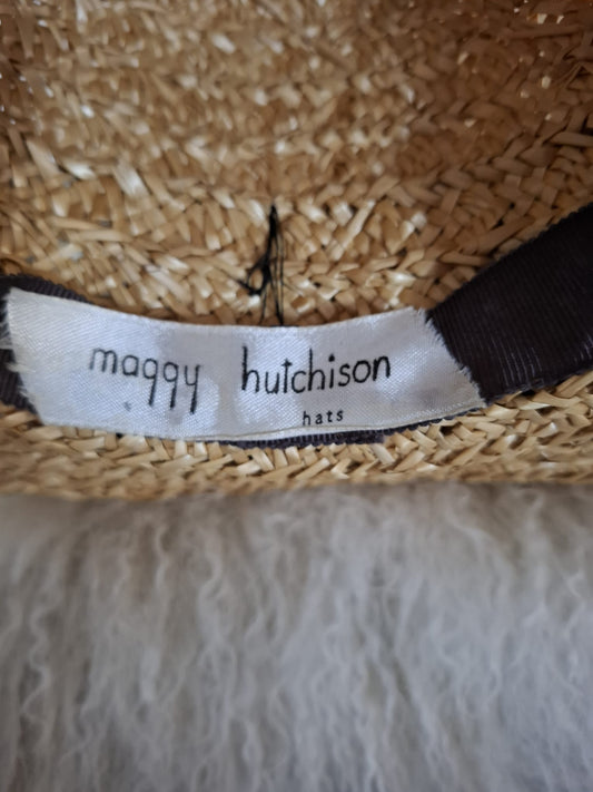 Maggy Hutchison  Sun Kissed and Timeless-A wide-brimmed straw hat with a touch of contrast — finished with a black velvet ribbon for effortless elegance.